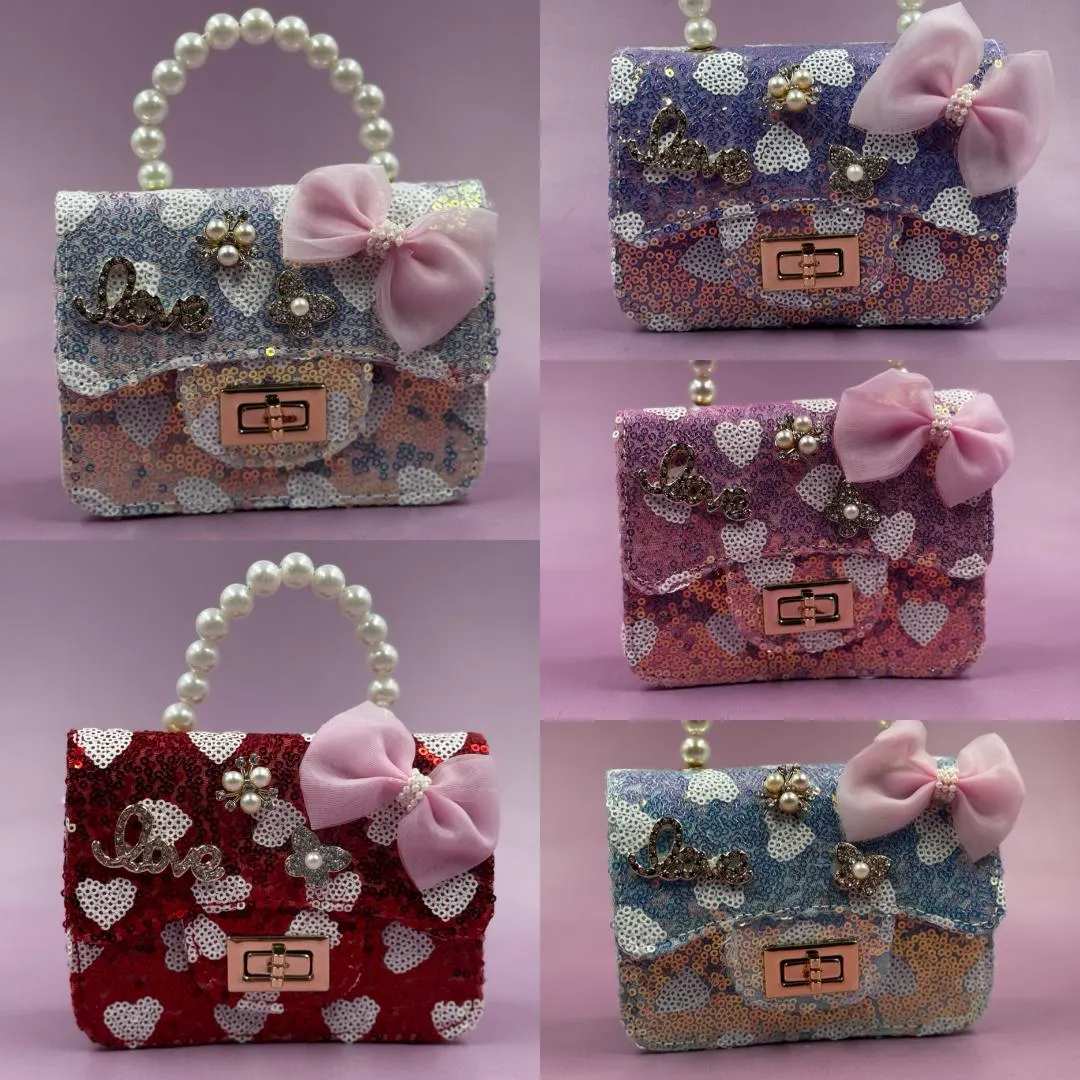 BOLSO MINI DE NIÑA CORAZONES REF:POP2