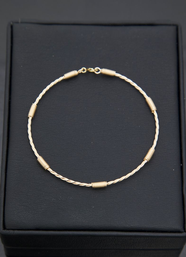 Pulsera alambre 7 nudos 