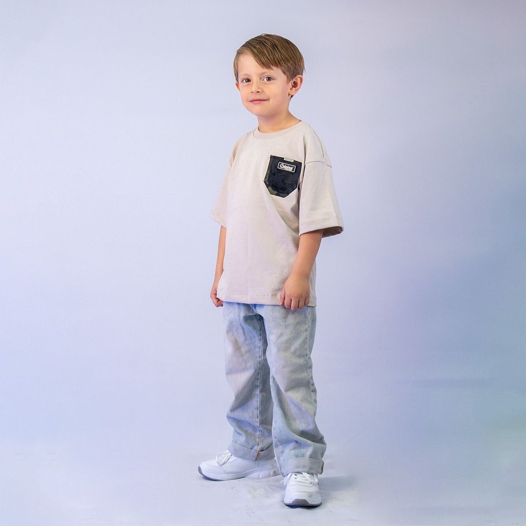 C. NIÑO OVER BOLSILLO MILITAR