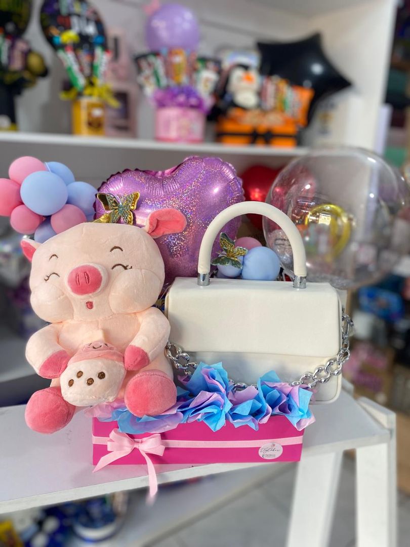 Detalle con cartera y peluche 