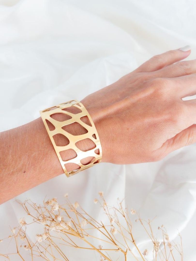 Brazalete perforación cuadros  acero 