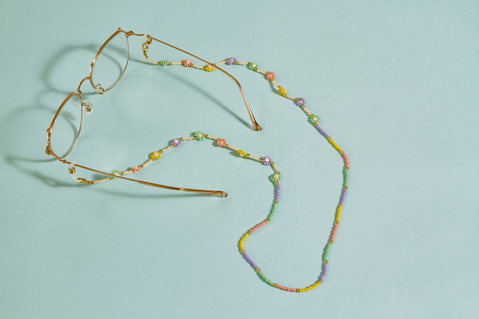 TIRA DE GAFAS FLORECITAS