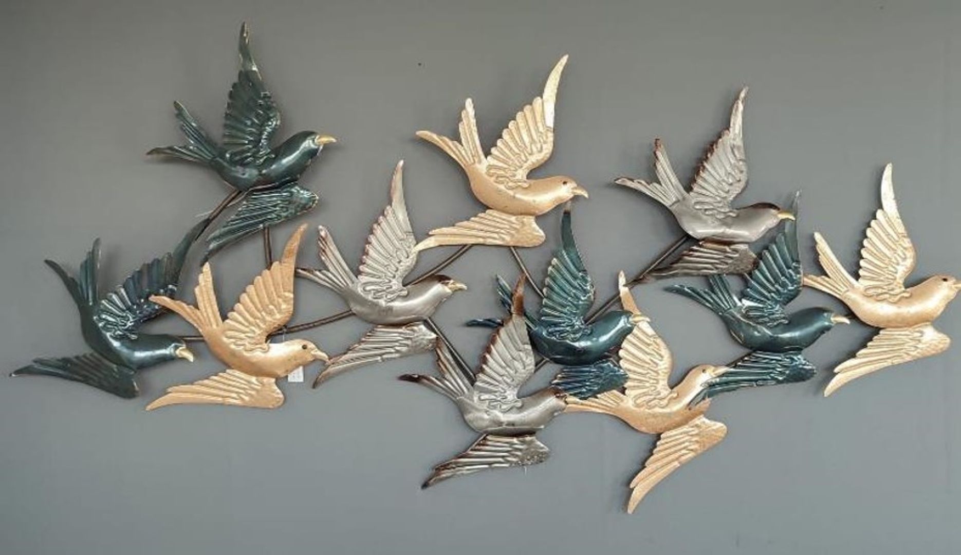 Pajaritos de latón.