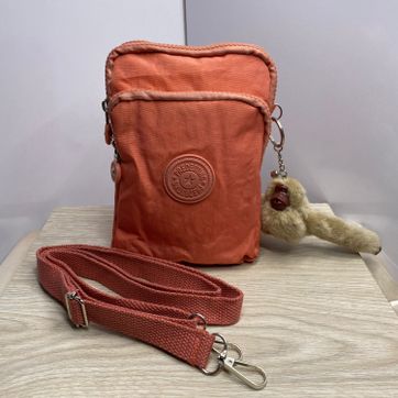 Imagen del producto Bolso porta celular color salmón 