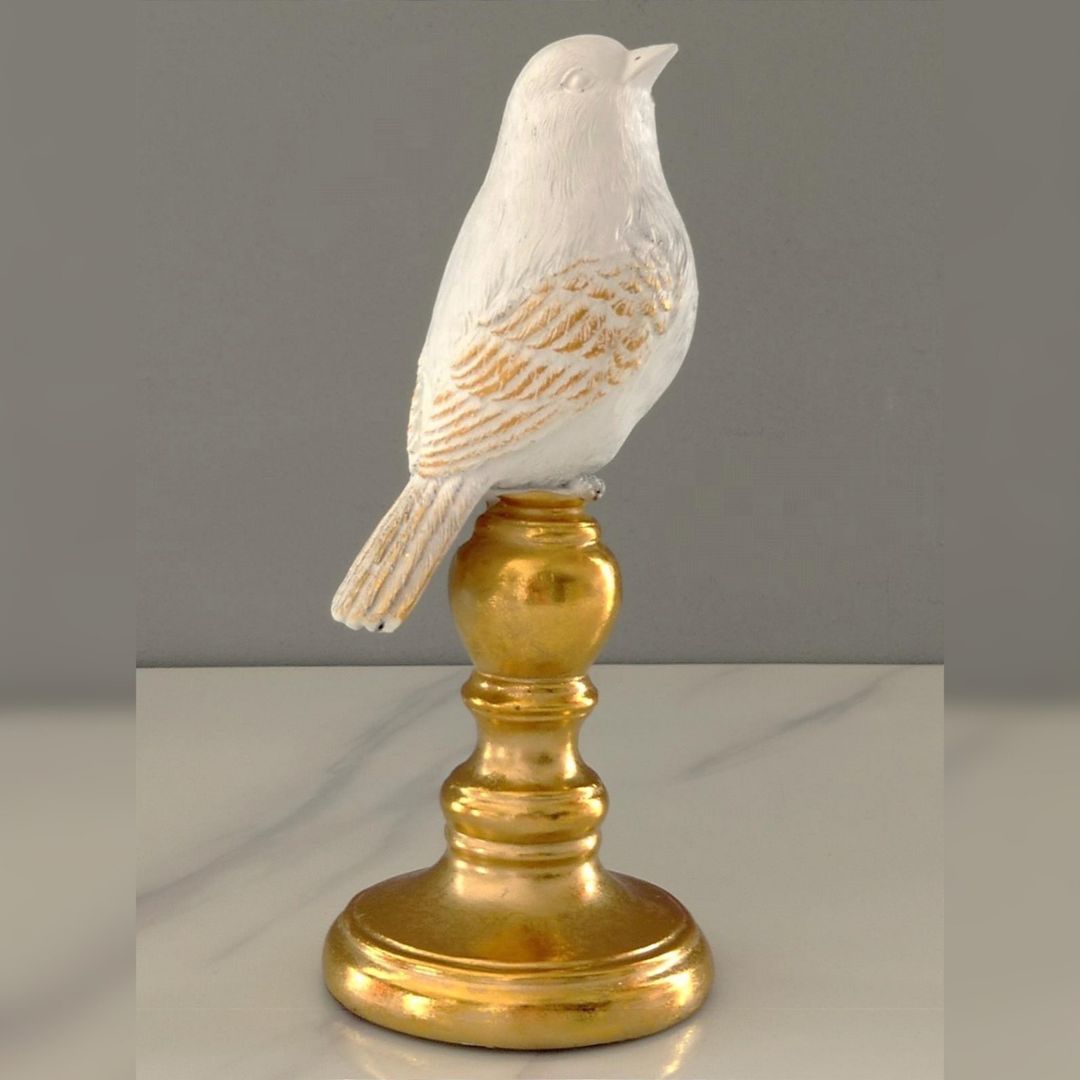 Figura de ave en resina blanco-dorado