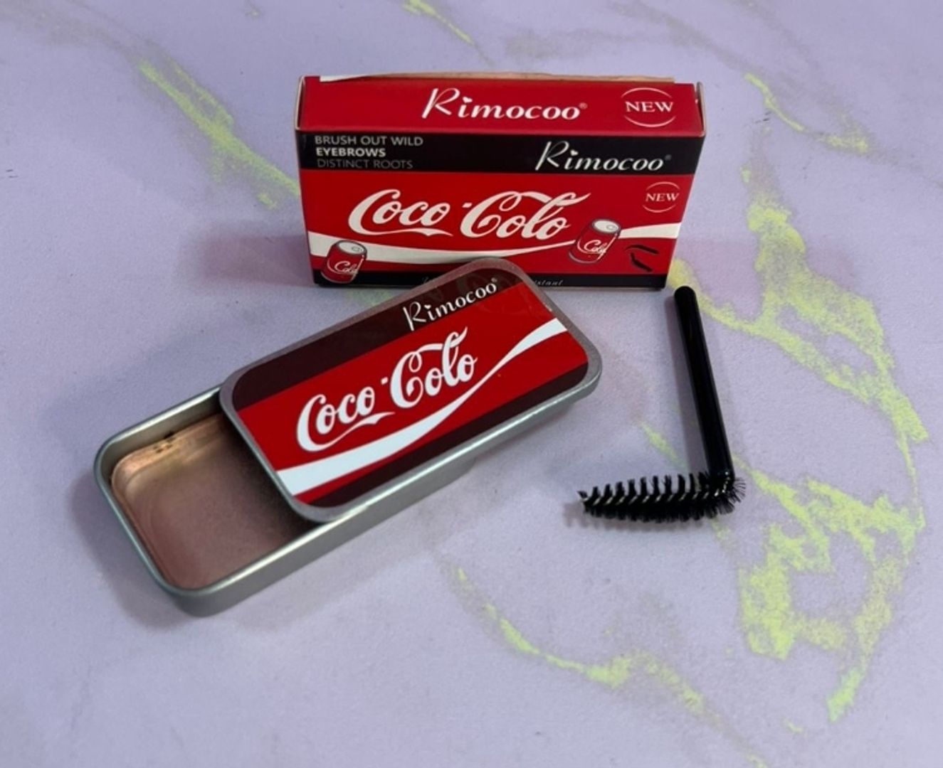 CERA FIJADORA DE CEJAS COCA COLA RIMOCO
