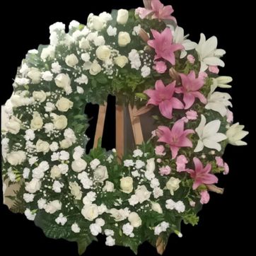 Imagen del producto corona en rosas, lirios y clavellinas