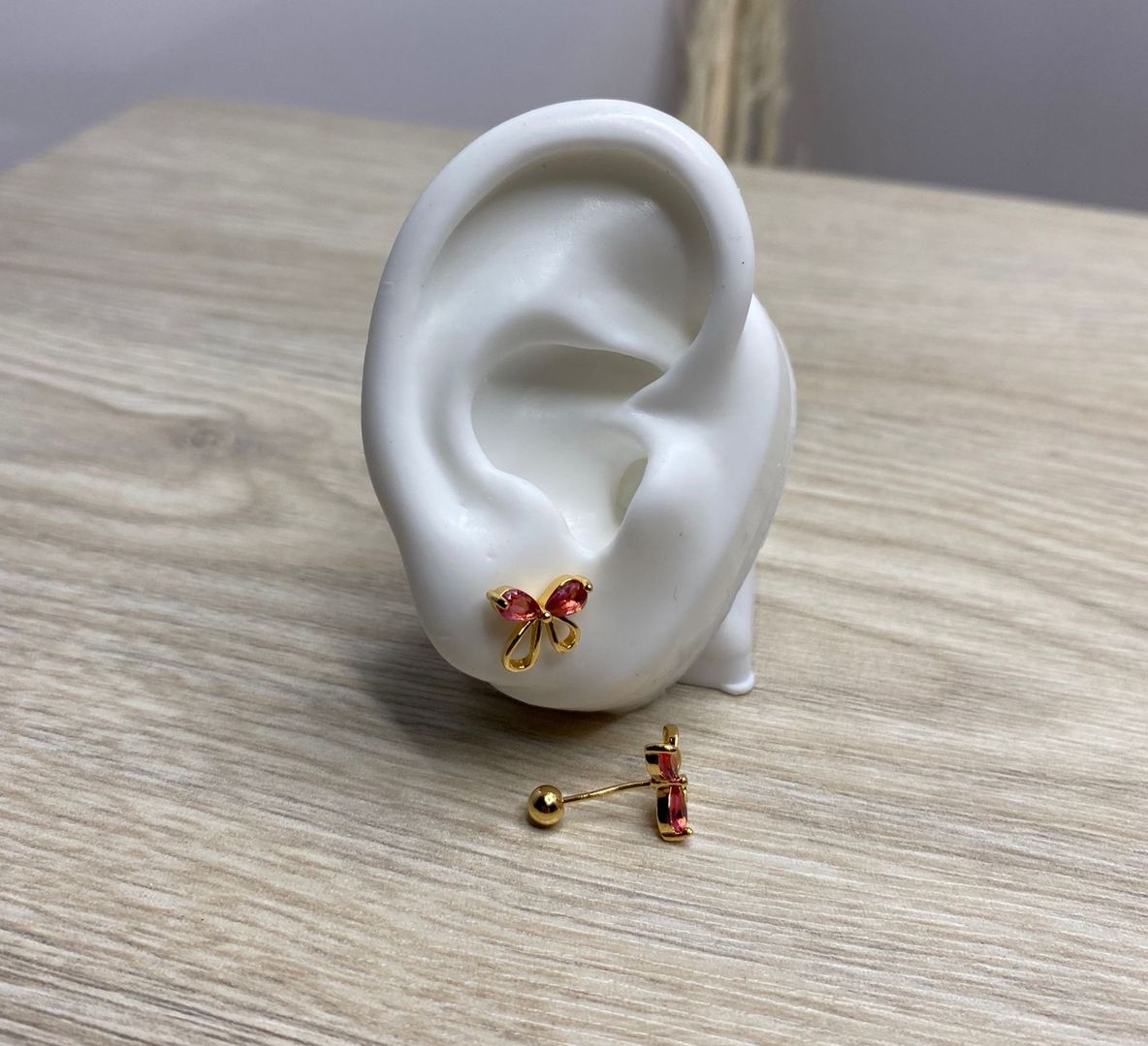 Topo de seguridad, mariposa rosada, covergold 