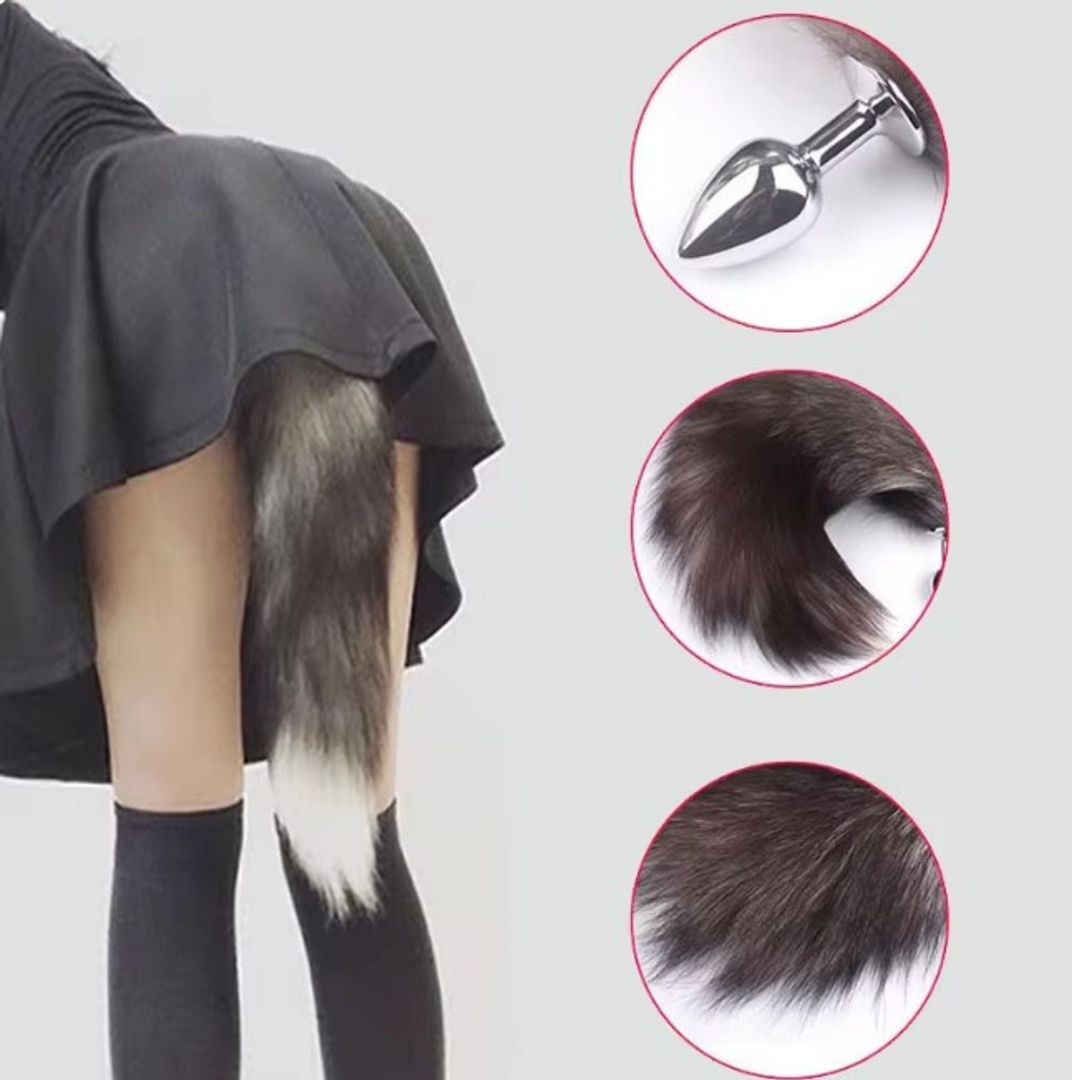 Plug anal  cola de zorro lila x blanco.