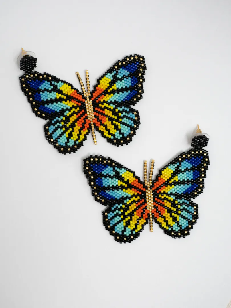 Arete Mariposa Miyuki con Topo