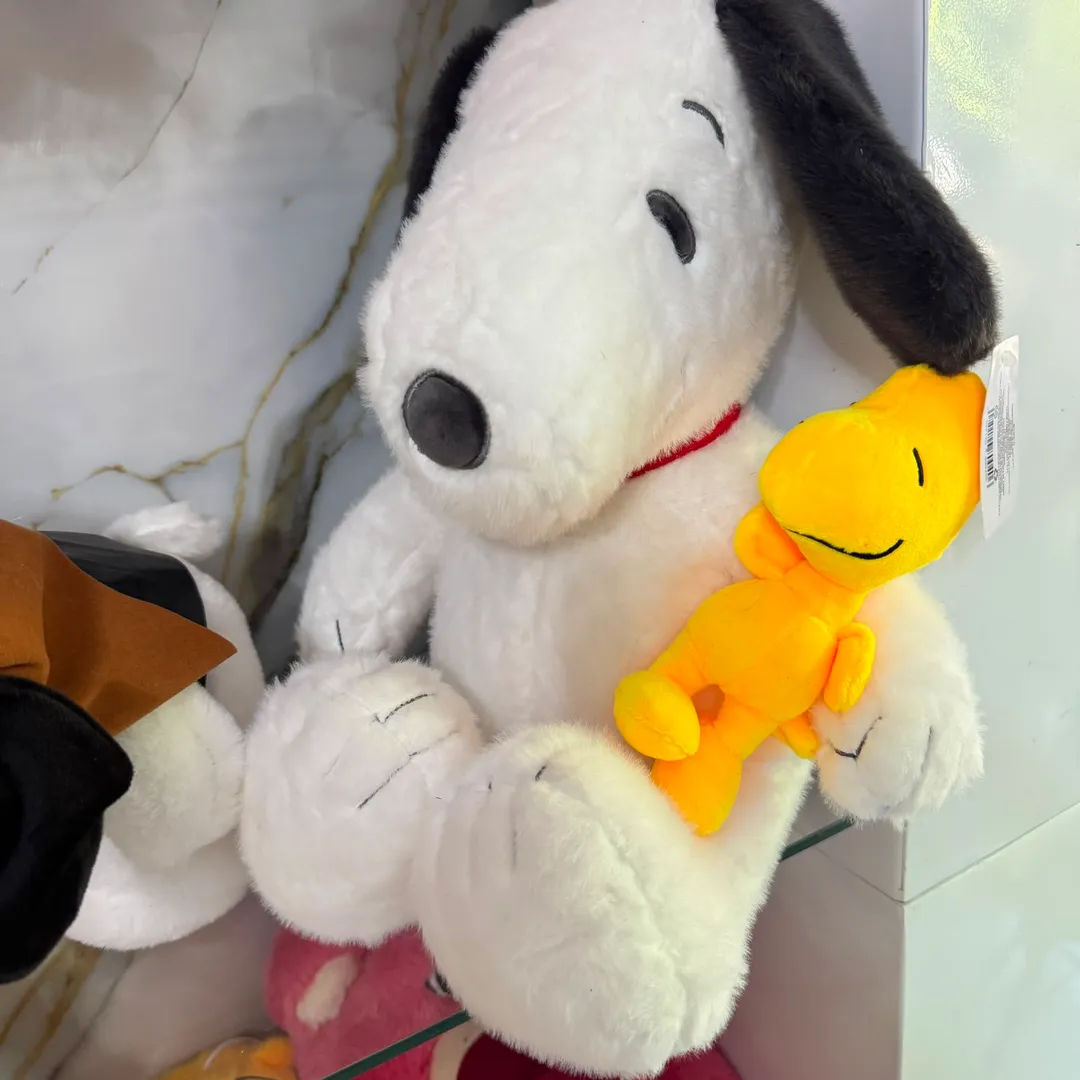 snoppy con peluche p