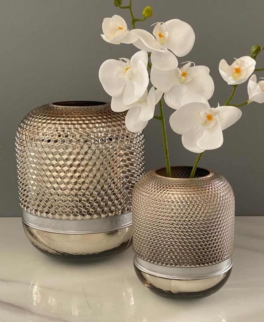 Floreros de cristal.