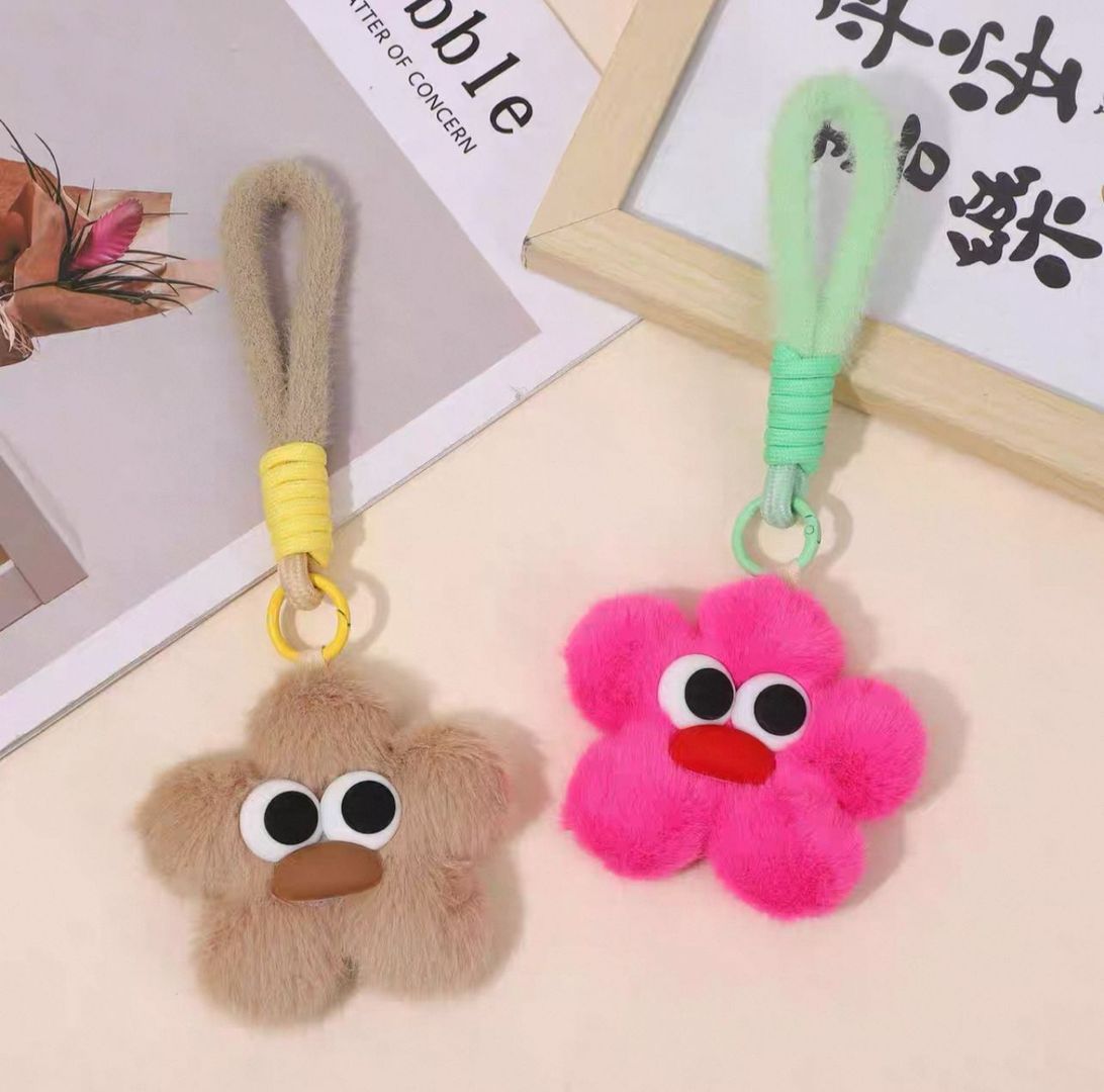 LLAVERO HUELLAS CARA FLOR