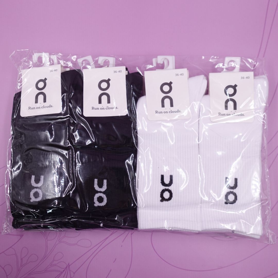 DOCENA DE MEDIAS BLANCAS Y NEGRAS