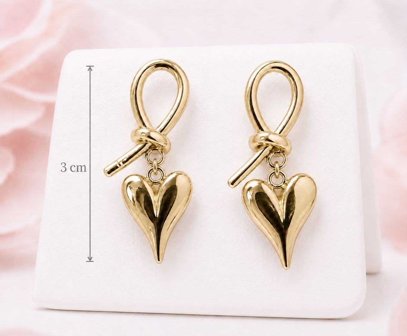 Aretes Lazo Corazón Dorado