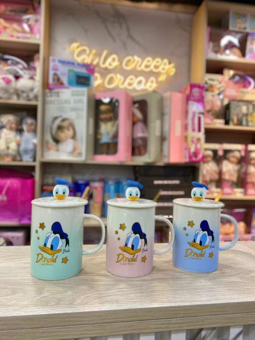 TAZA DONALD CON TAPA FIGURA