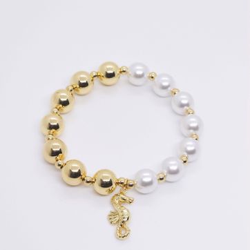 Imagen del producto PULSERA CABALLO DE MAR CON PERLAS RODINADA