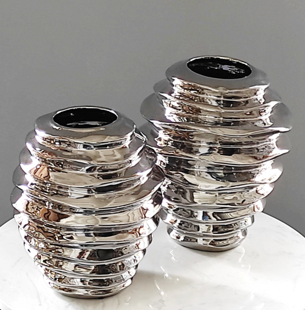 Floreros en cerámica plateados