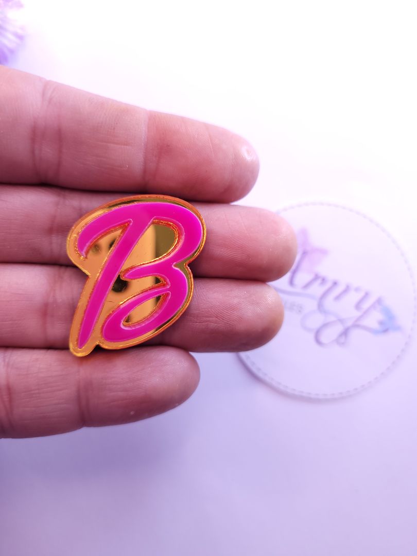 Acrílico 3.5x2.5cm B Dorado y fucsia