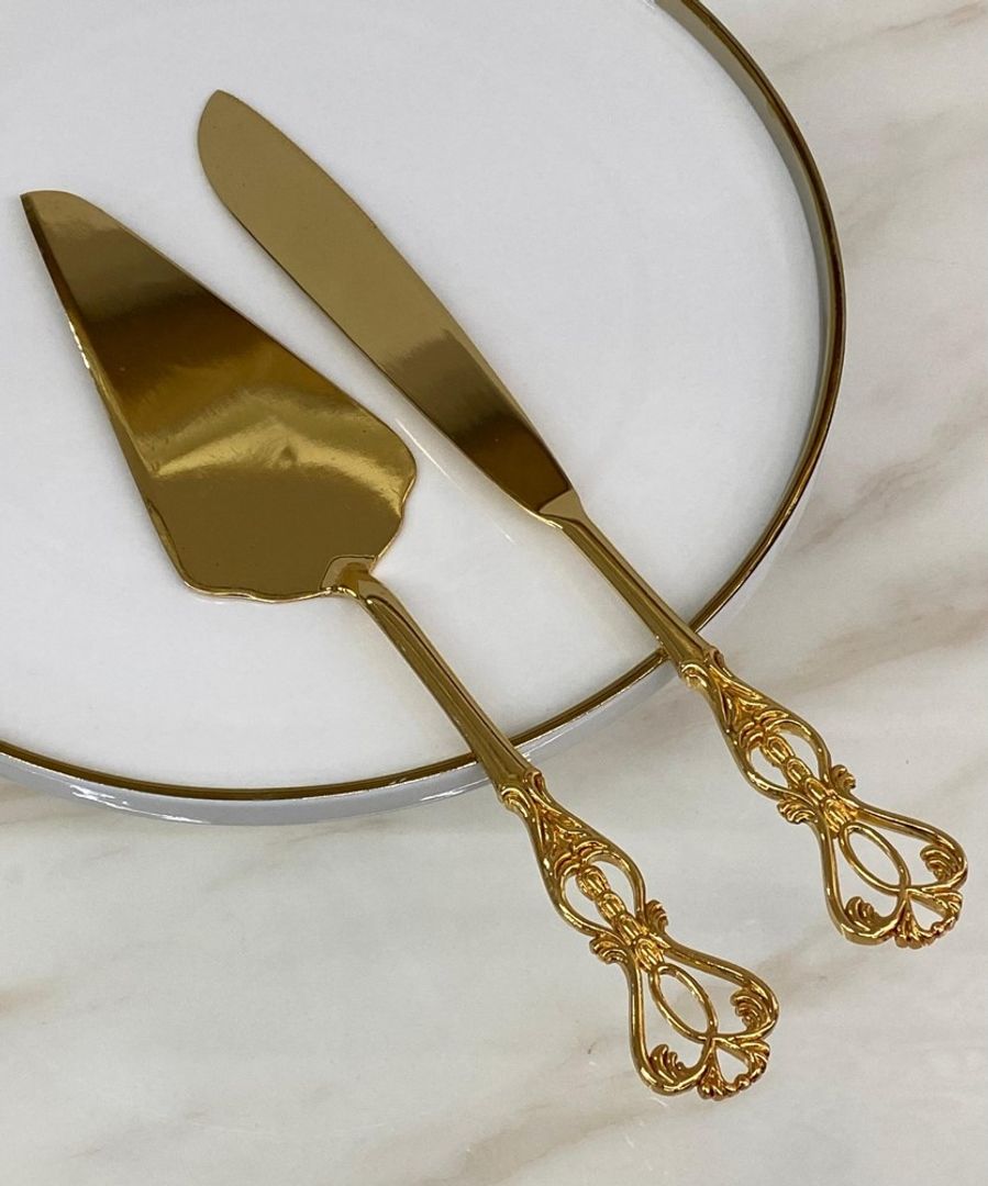 SET DE CUCHILLO Y CUCHARA EN ACERO COLOR DORADO