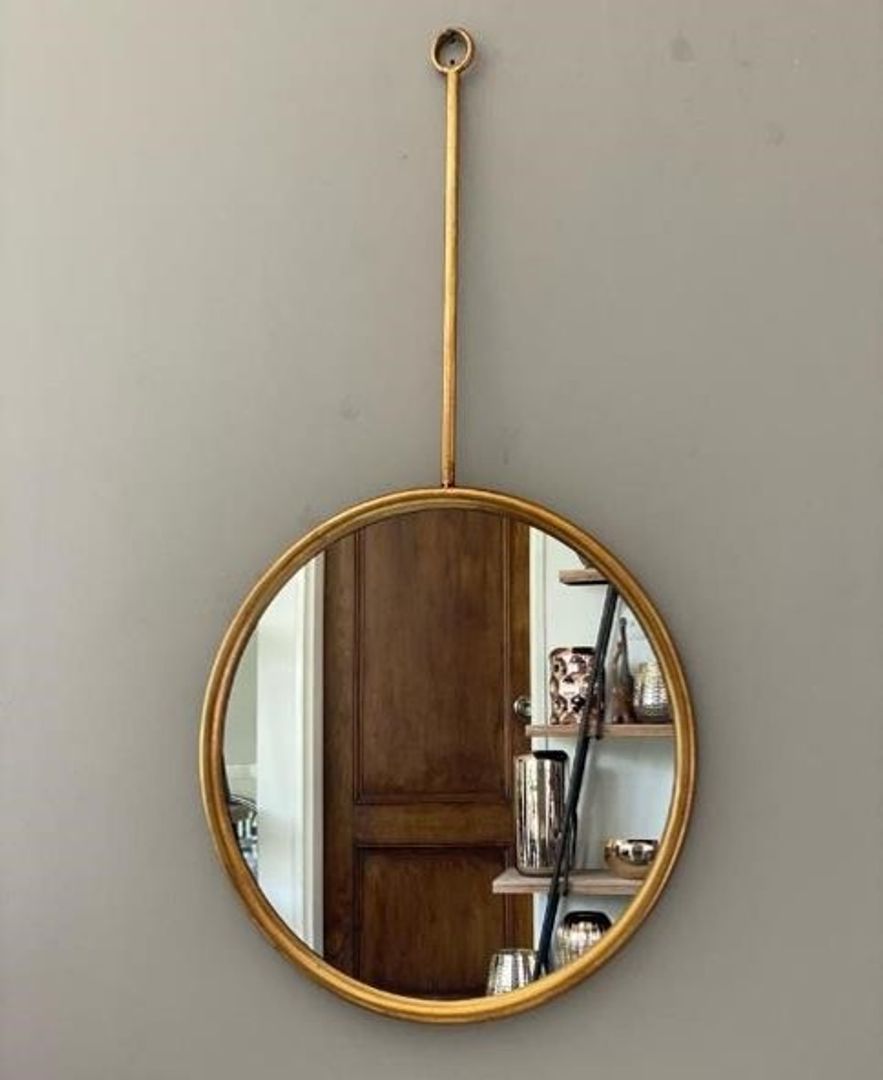 Espejo circular dorado