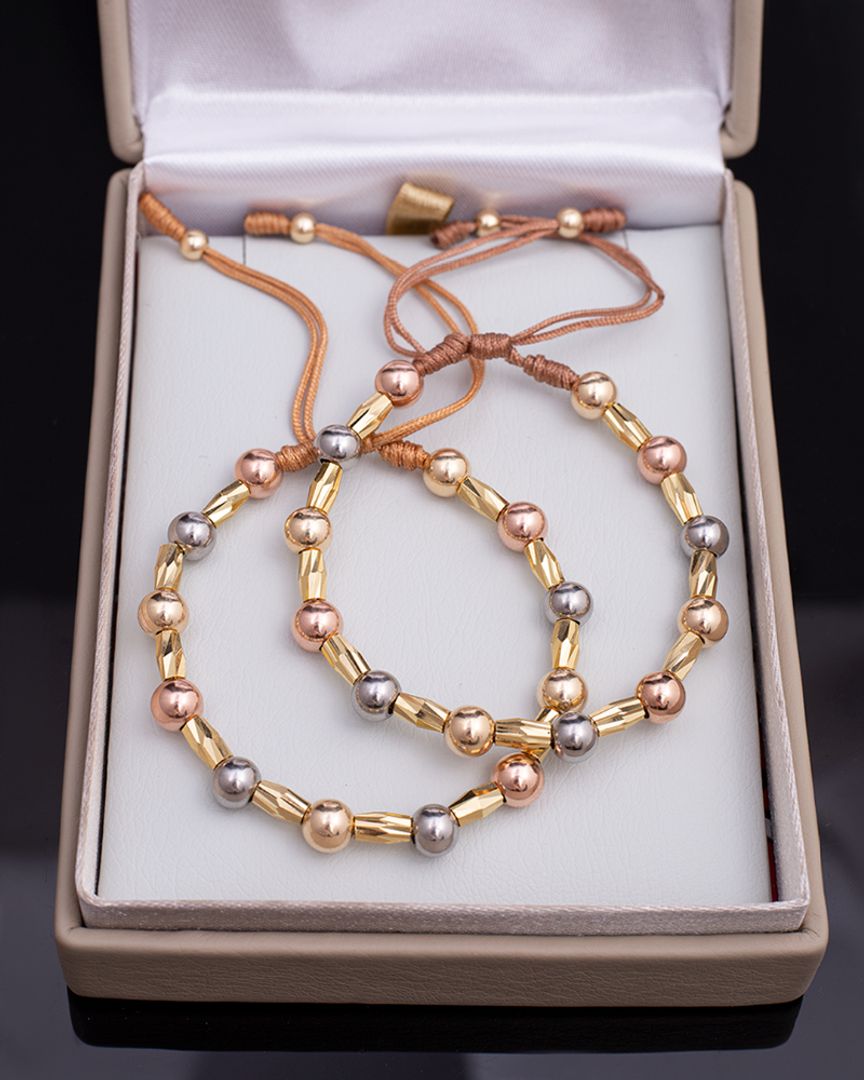 Par manillas tres oros 