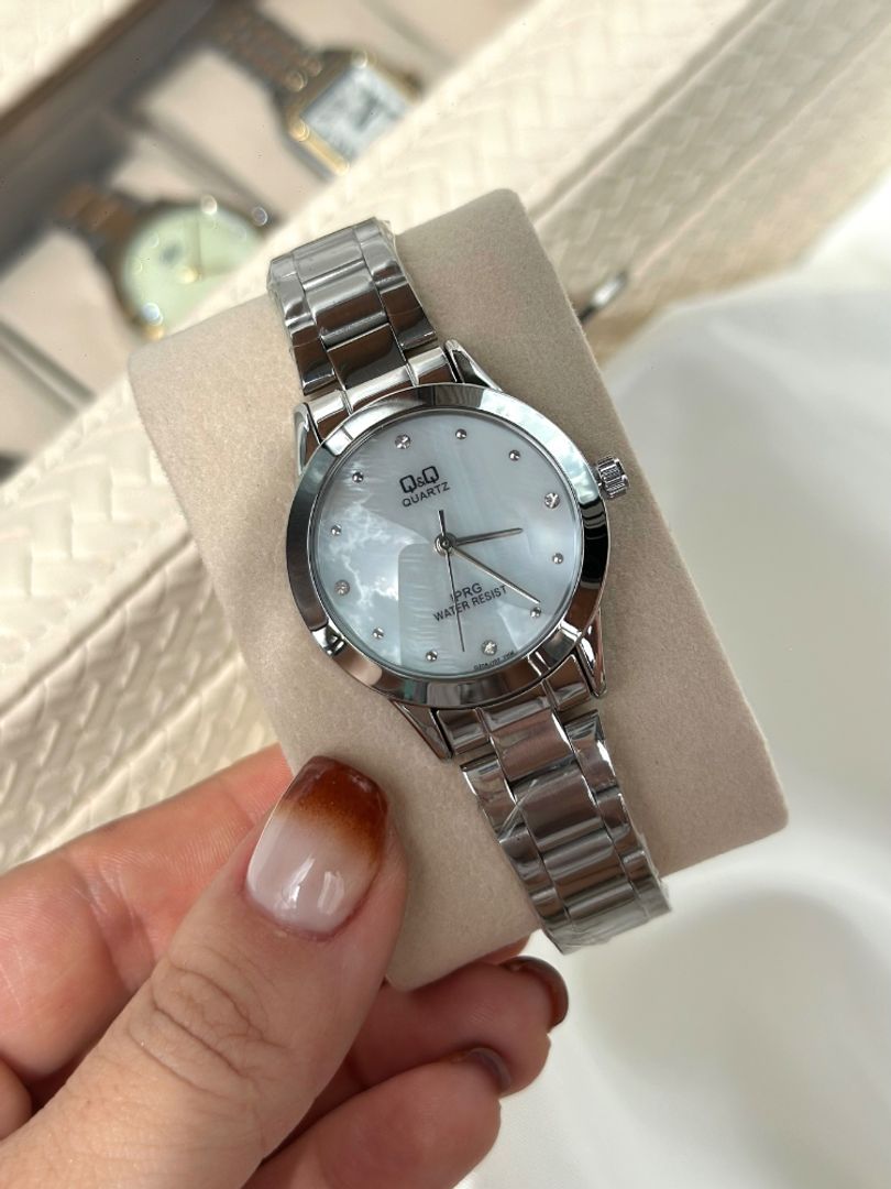 Reloj redondo plateado blanco 