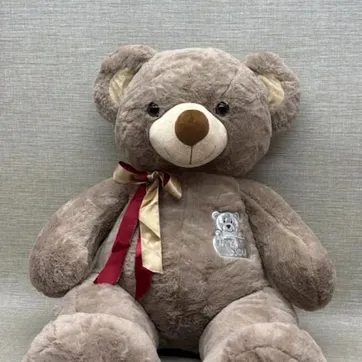 Imagen del producto OSO CON BORDADO Y MOÑO 60 CM