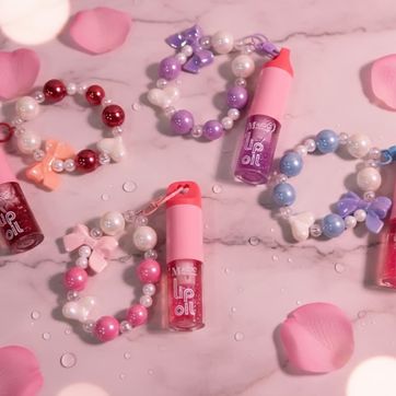 LIP OIL CON BRILLOS Y LLAVERO – MAGIC YOUR LIFE - imagen 1