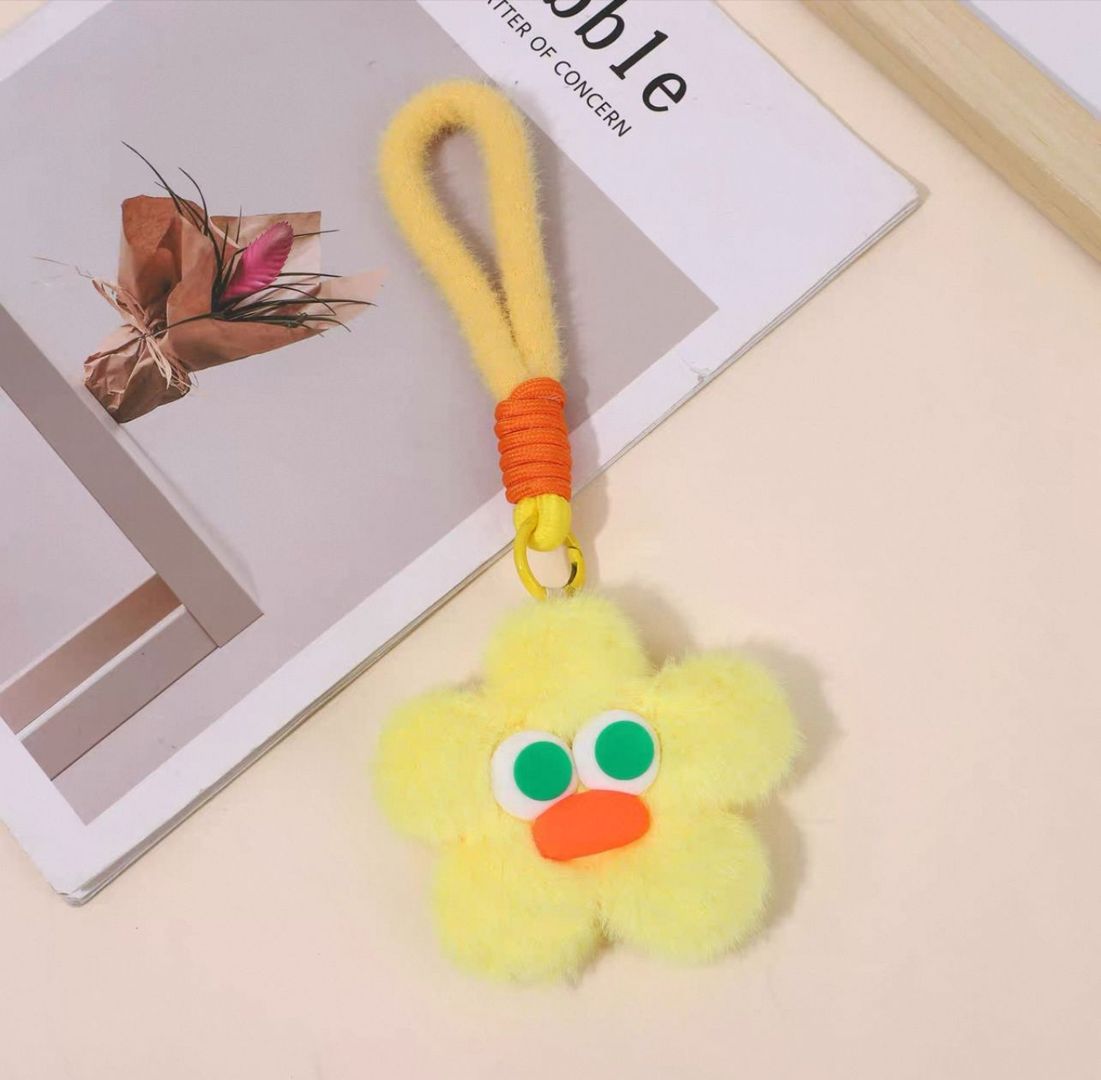 LLAVERO HUELLAS CARA FLOR