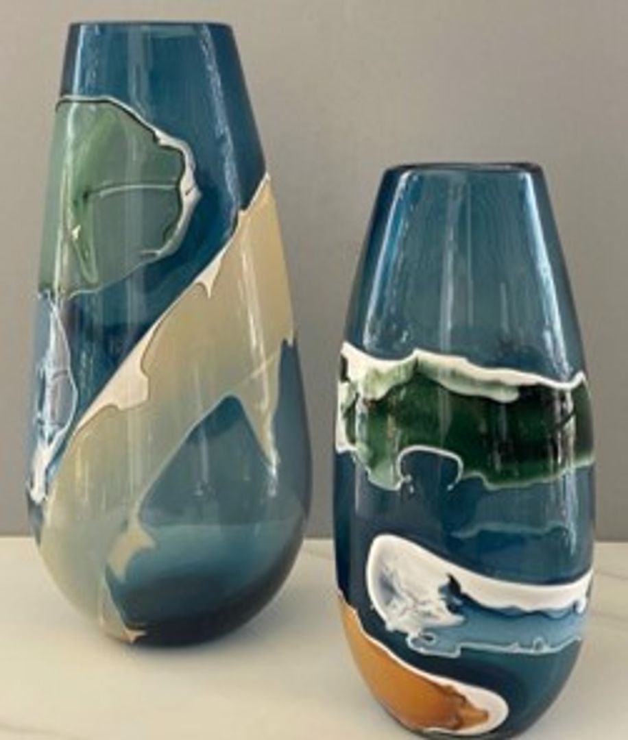 Floreros de cristal.