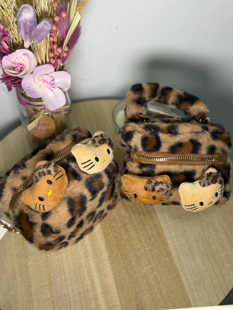 MINI BOLSO ANIMAL PRINT PELUCHE HK