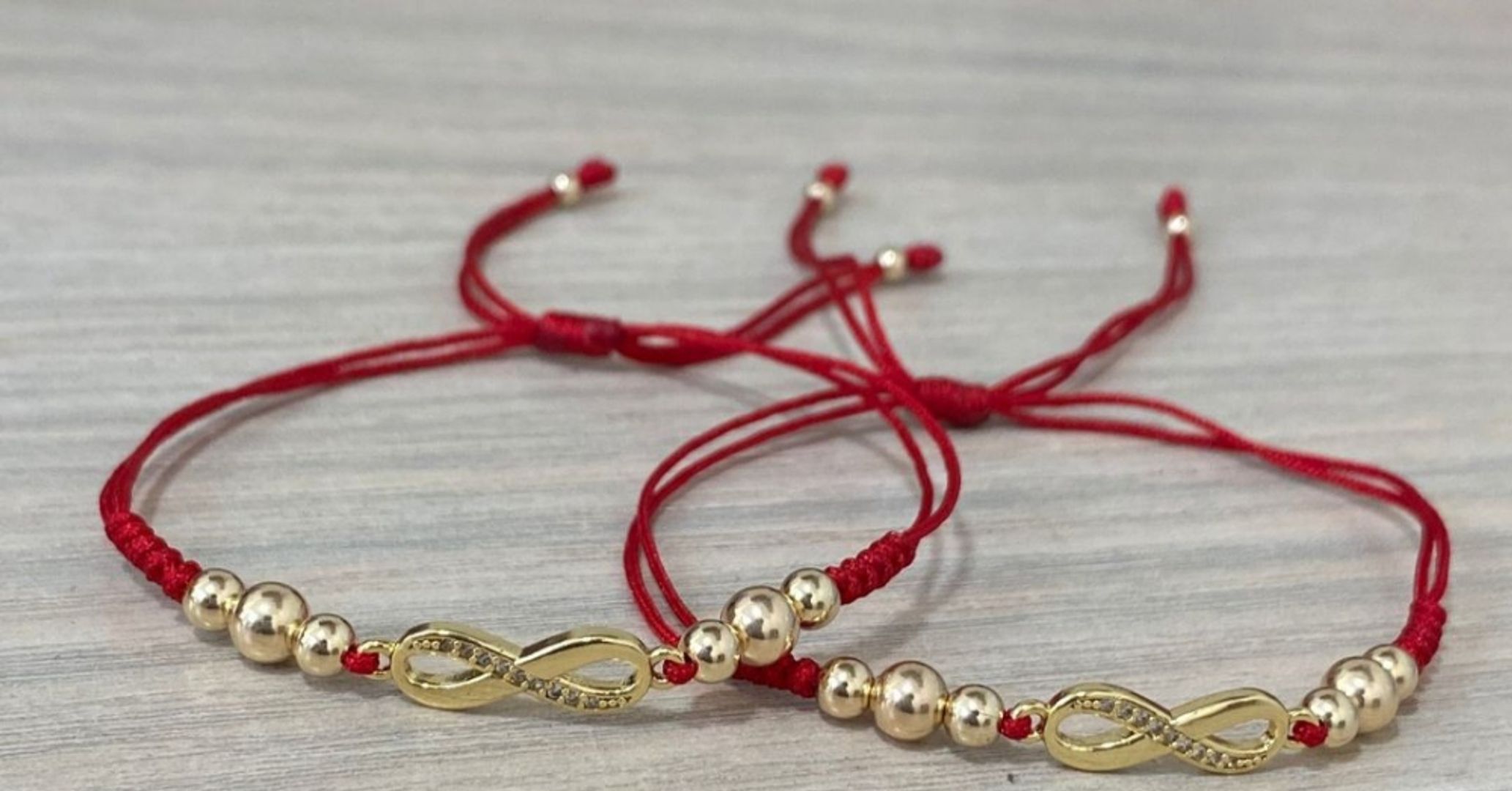Par pulseras infinito balin liso