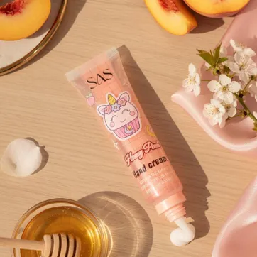 Imagen del producto CREMA PARA MANOS “HONEY & PEACH" — SAS