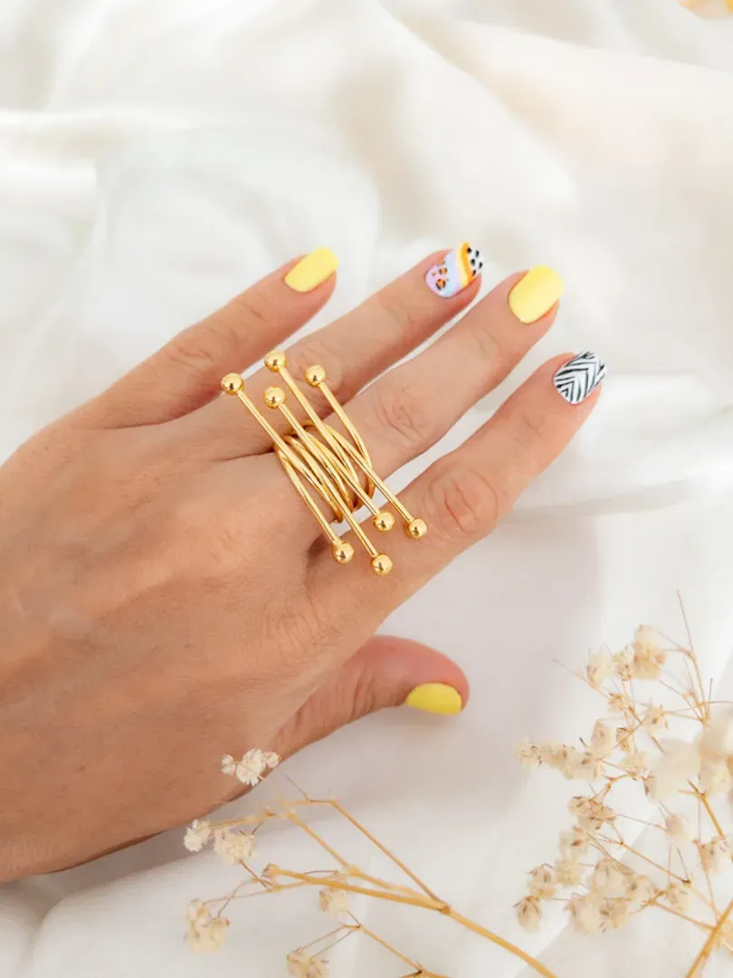 Anillo en acero con baño de oro 24k