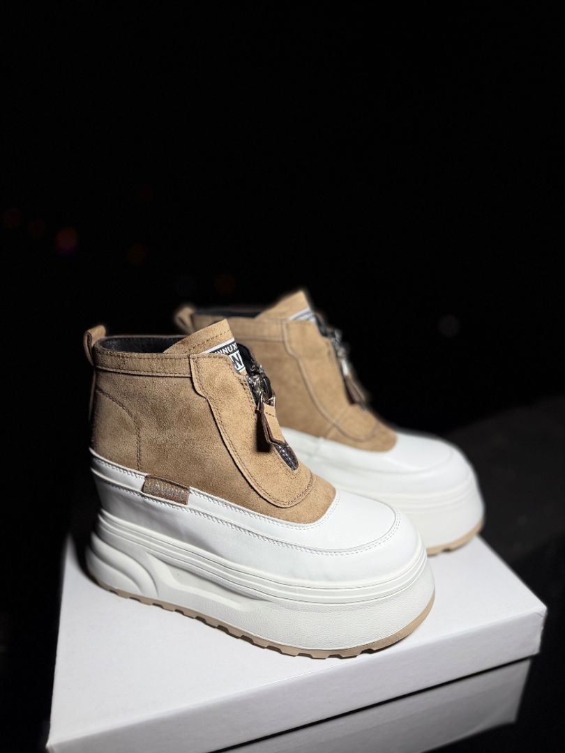 Botín con cremallera