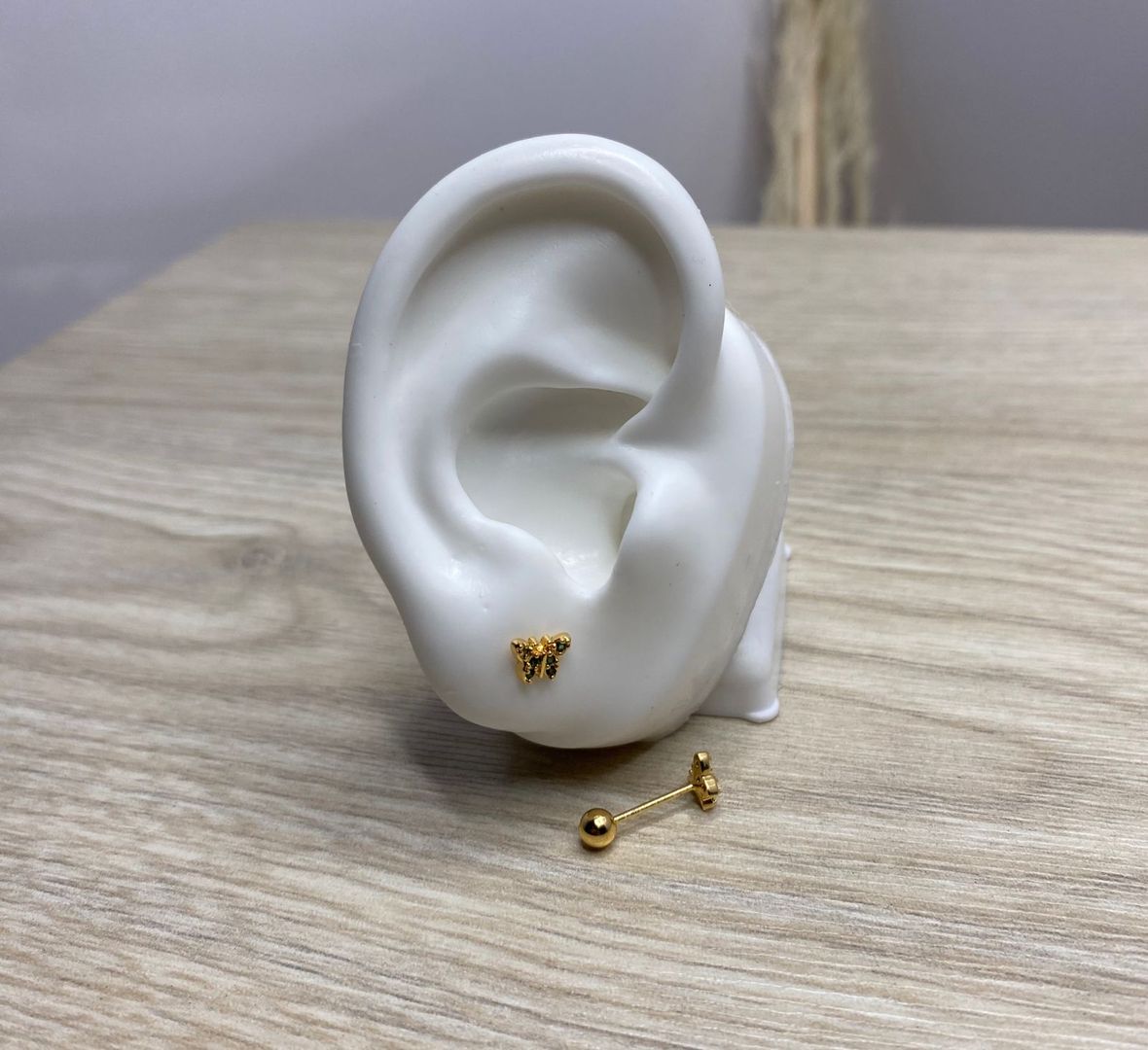 Topo de seguridad, mariposa piedra verde, covergold 