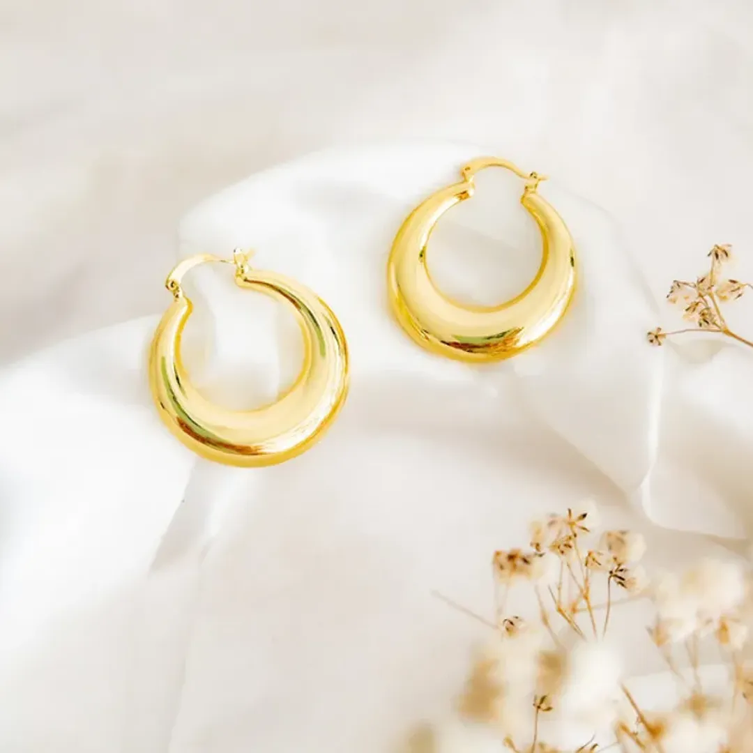 Pendientes en acero con baño de oro 24k