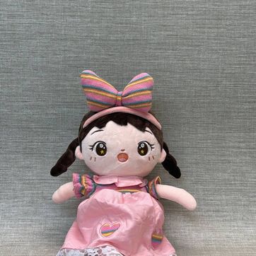 Imagen del producto MUÑECA CON MOÑO ROSA 45 CM