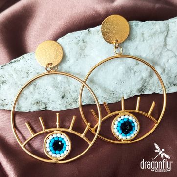 Imagen del producto Aretes en bronce ojo  tejido a mano en mostacilla  