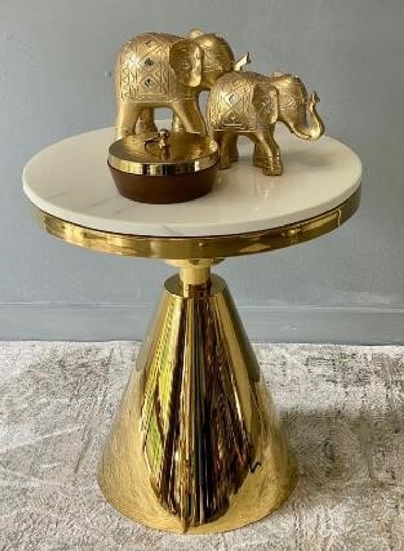 Mesa dorada en acero y marmol