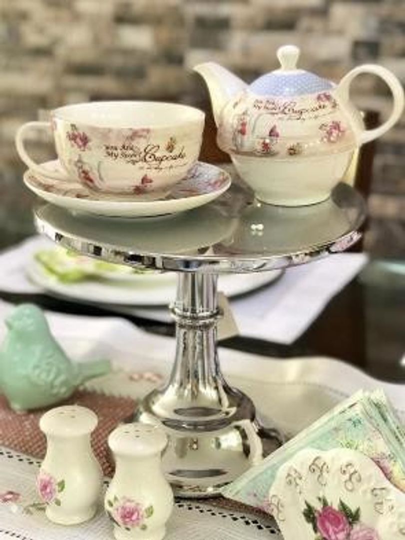 Base para pasteles en metal plateado.