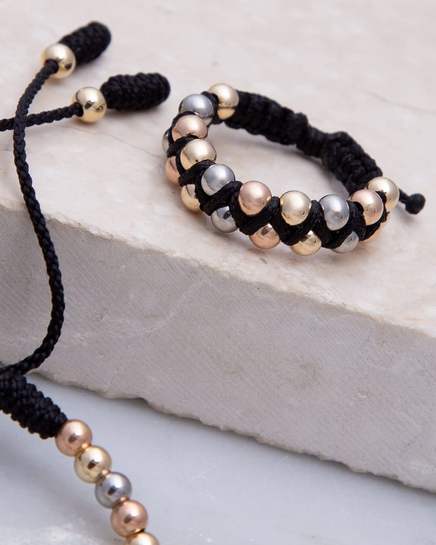 Anillo zigzag tres oros