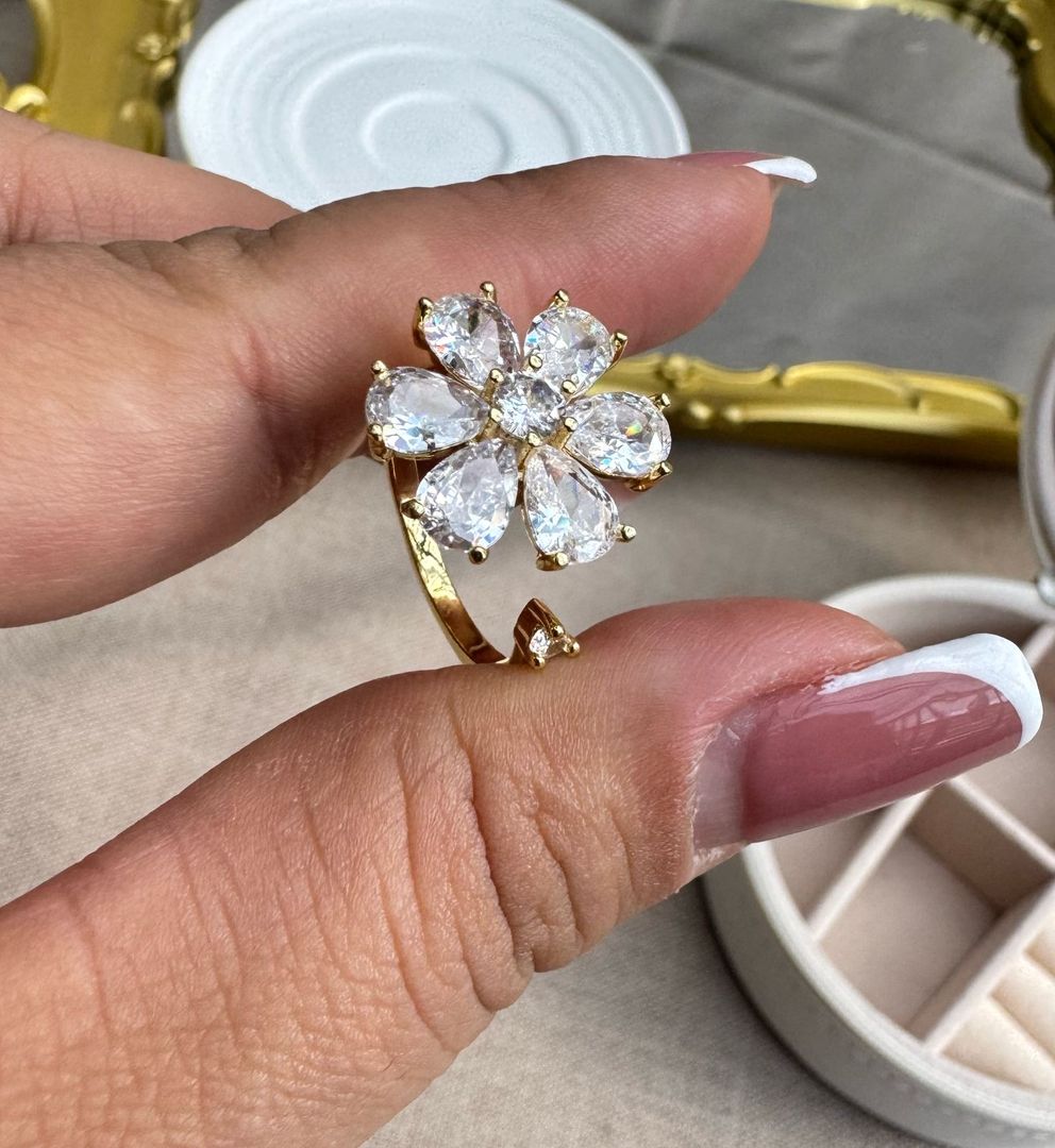 Anillo giratorio flor grande rodio 