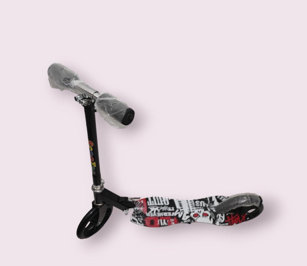 monopatín metálico 