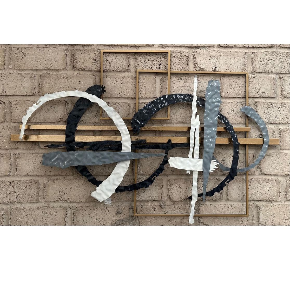 Cuadro para pared en latón.