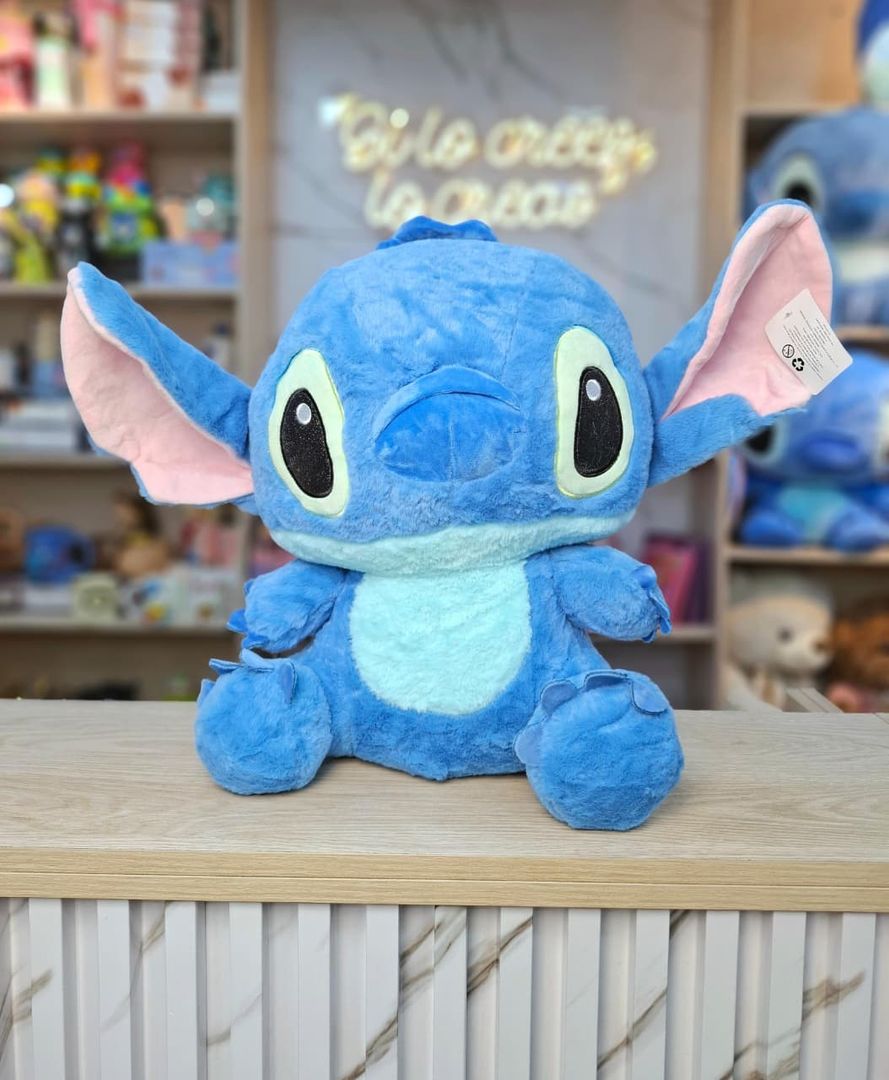 ANGELA & STICH OJOS ESCARCHADOS 40CM