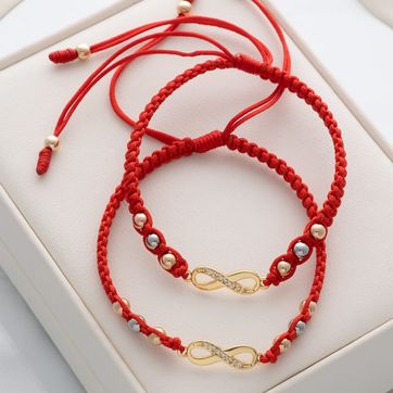 Imagen del producto Par manillas infinito tres oros 