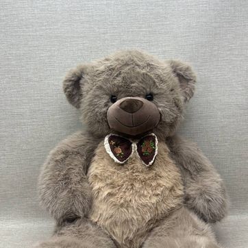 Imagen del producto OSO PELUDITO CON MOÑO SURTIDO 80 CM