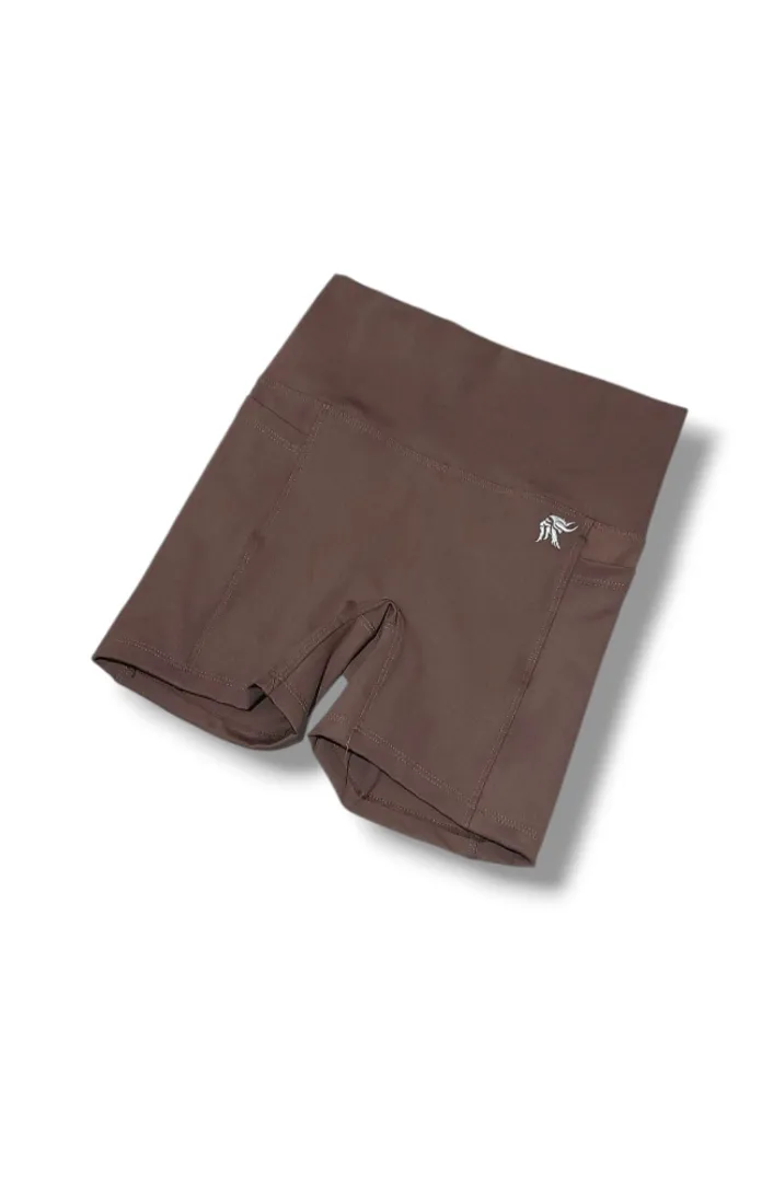 Short Hybrid ajustado con bolsillos laterales y sin costura delantera tiro alto Lycra